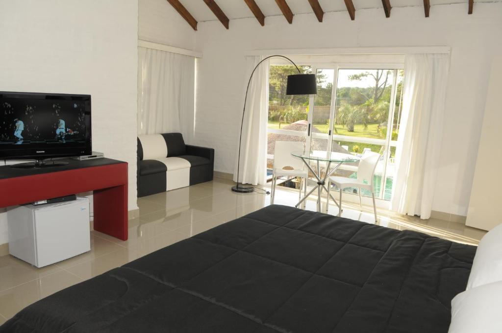 Punta Del Este Arenas Hotel Chihuahua Rum bild
